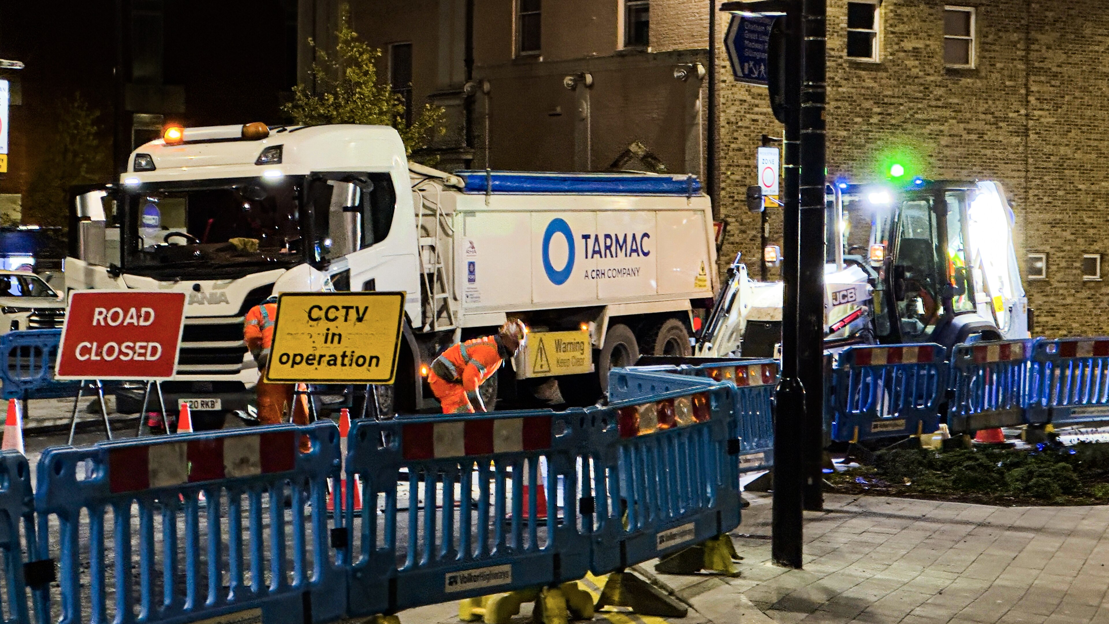 Roadway construction crew and civil infrastructure delivery activity